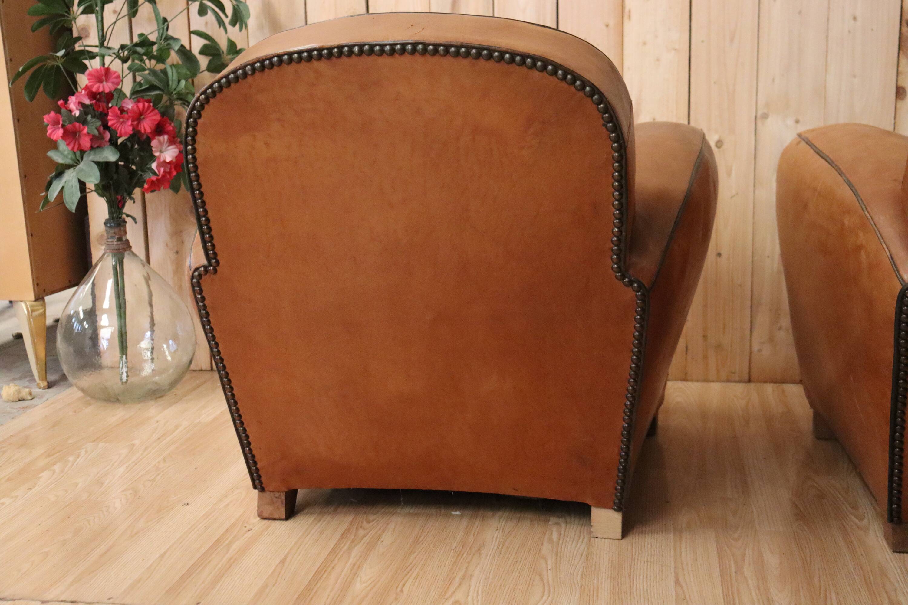 Pair of Art Deco leather club armchairs from the 1930s.