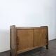 Buffet moderniste en chêne à porte coulissante