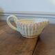 Gravy boat in slipware