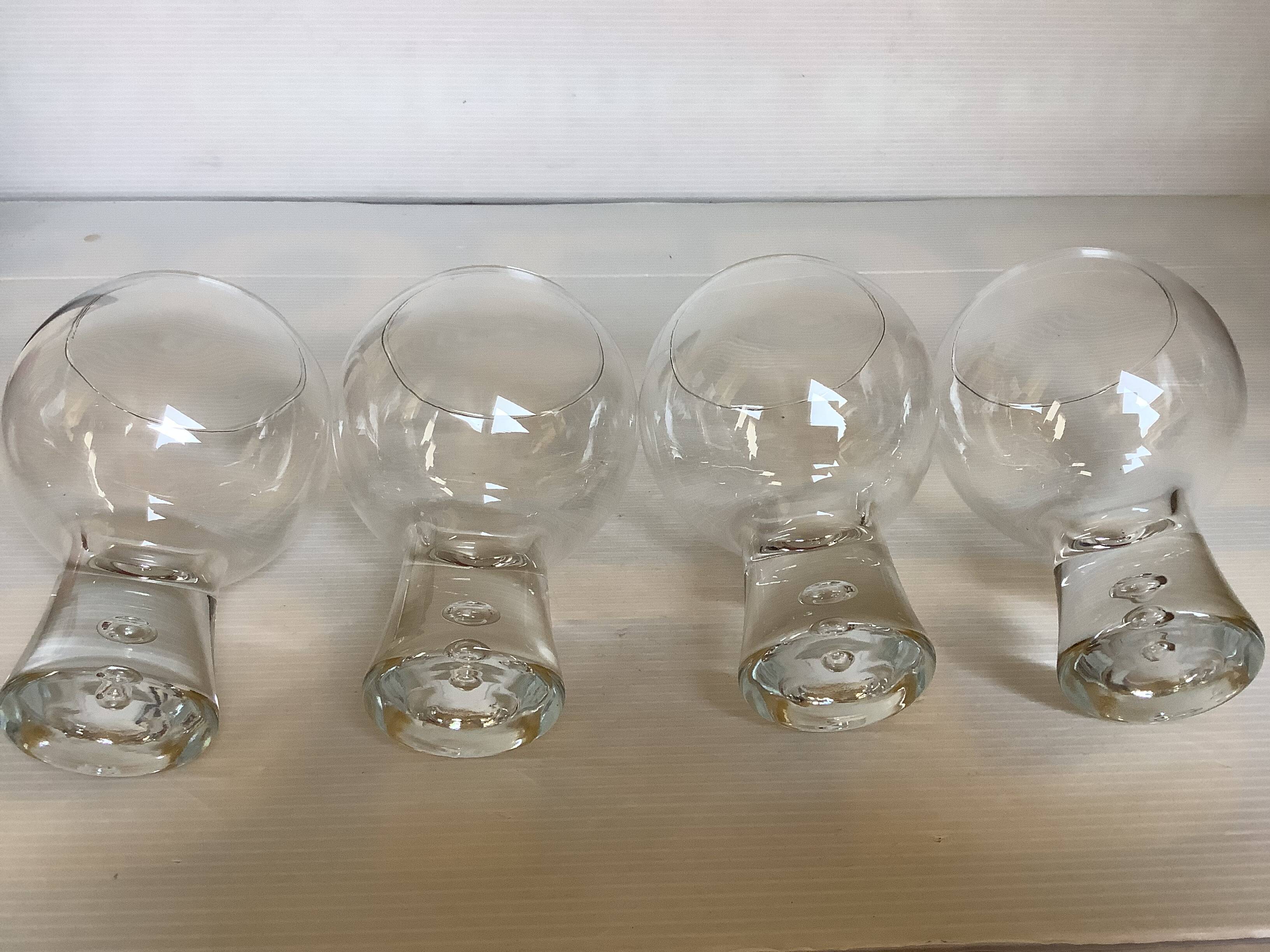 Four large bubble-style glasses by Kosta Boda.