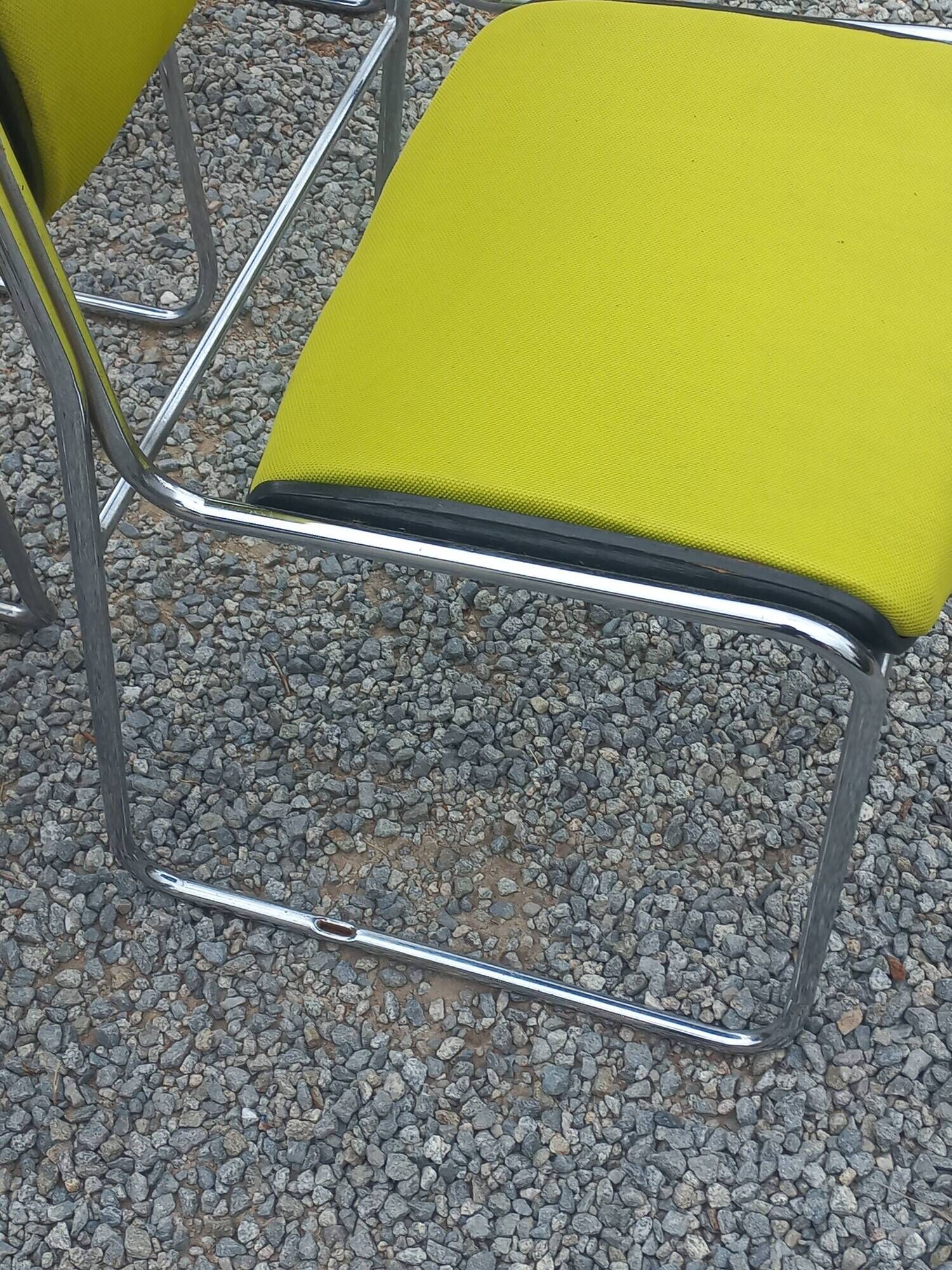 Set of 6 designer chairs with wooden seats and backs, chrome legs.