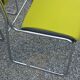 Set of 6 designer chairs with wooden seats and backs, chrome legs.