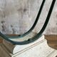 Glass and metal console with antique patina