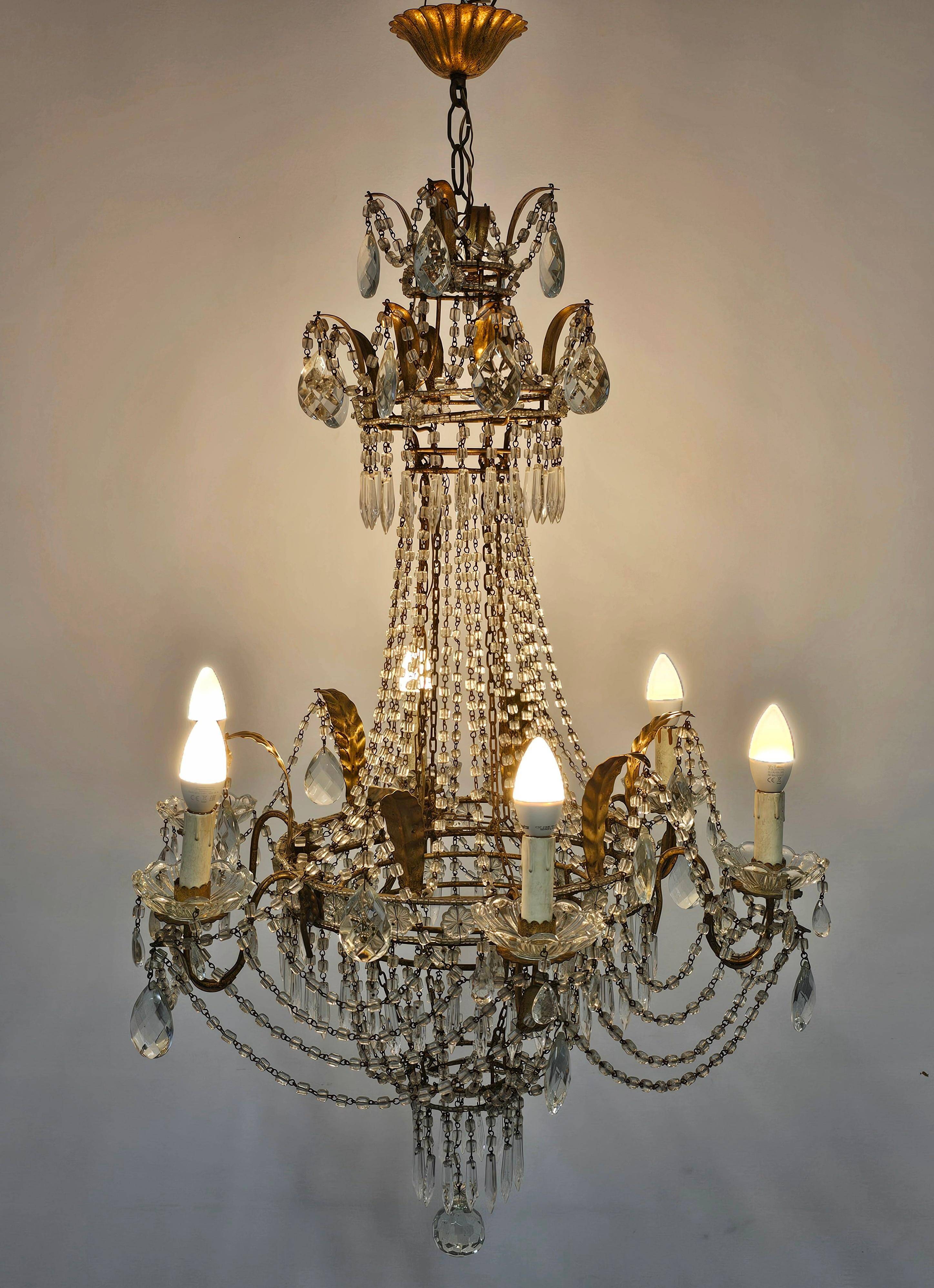 Antique crystal chandelier with floral details 1910