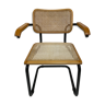 Cesca model chair designed by Marcel Breuer with black-framed armrests