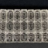 Set of 12 molded glass or crystal knife rests with diamond point decor