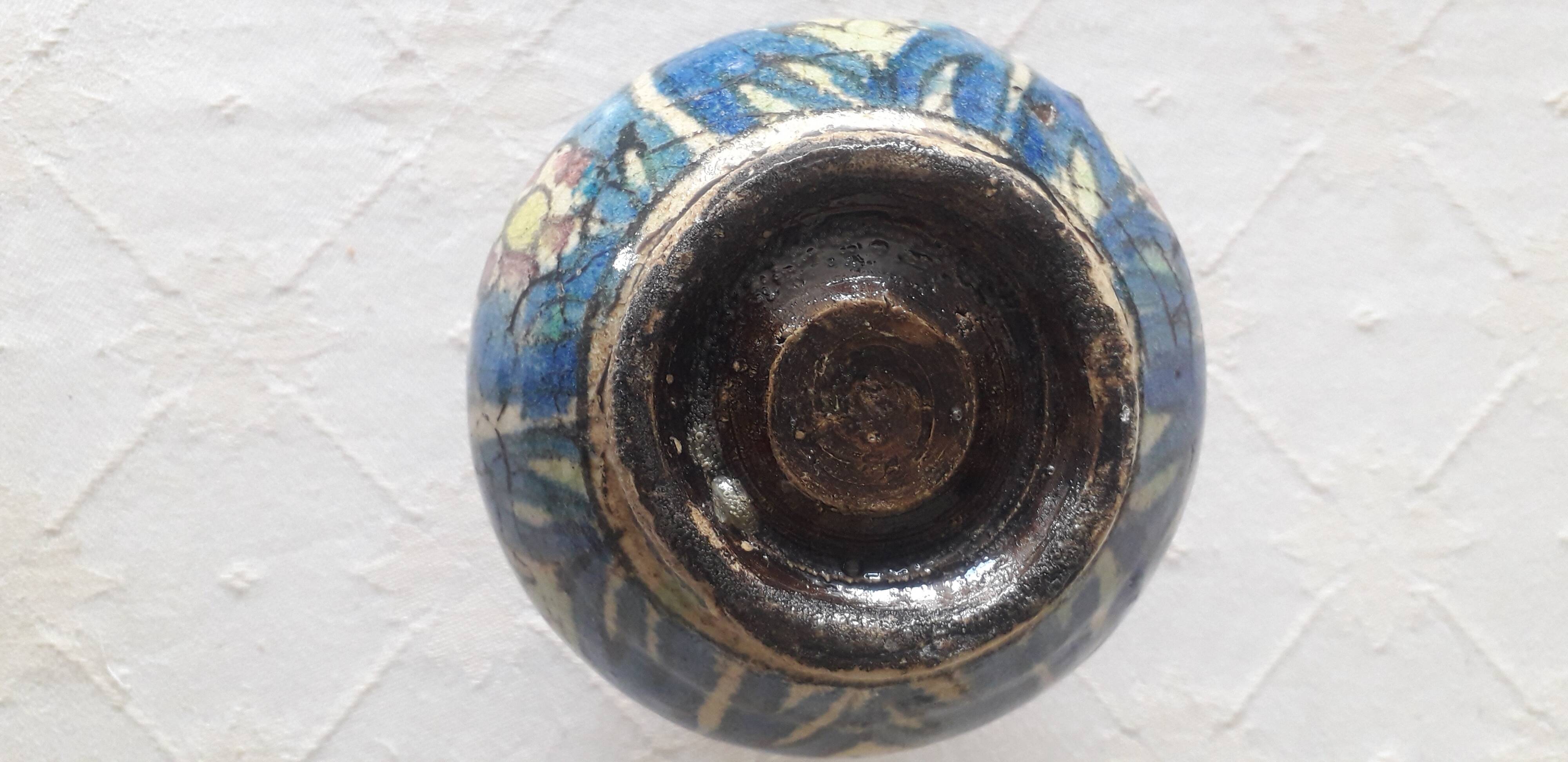 A very original antique vase with a floral design.