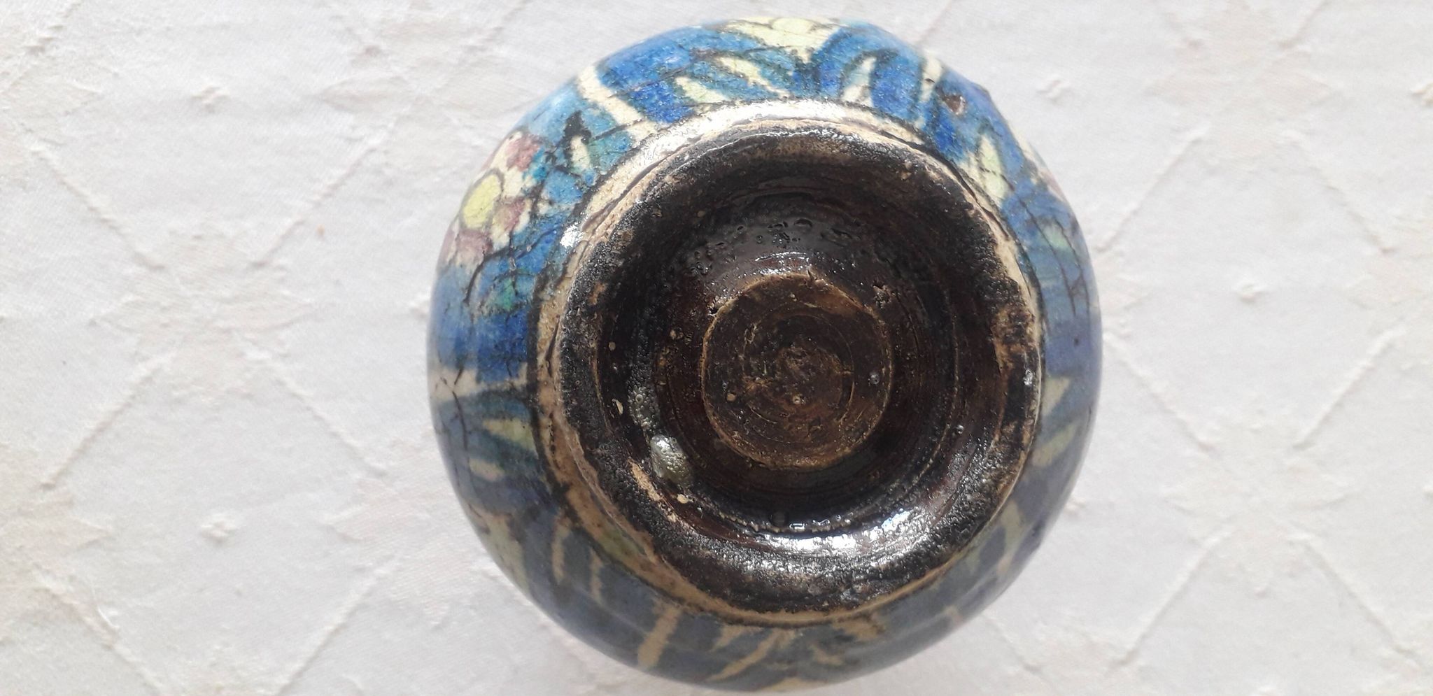 Very original antique vase with a floral decoration.