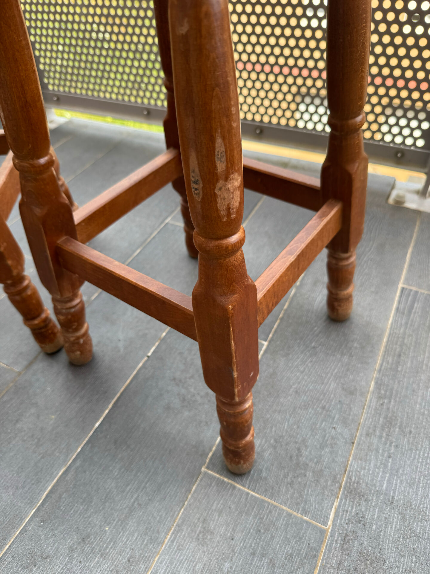 pair of vintage wooden and leather bar stools