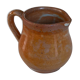 Creamy milk pot in sandstone