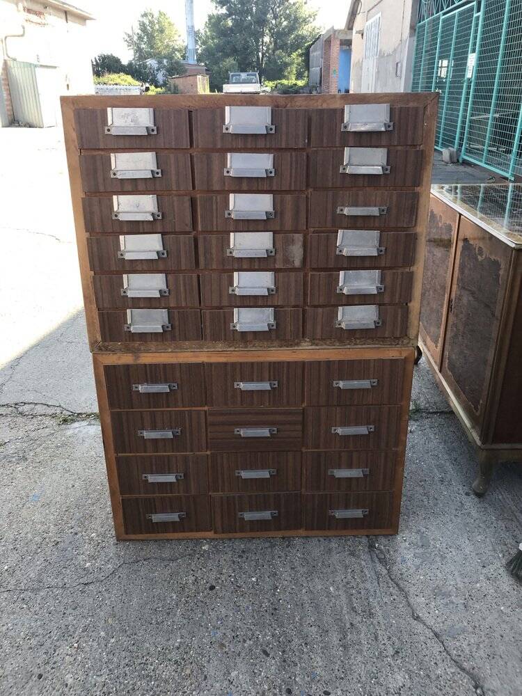 Brown wooden industrial wardrobe, multiple drawers, 1950s, workshop storage, Czech Republic.