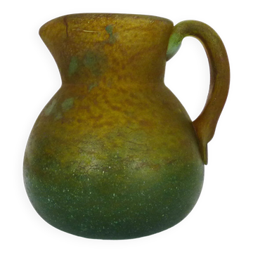 Pitcher in orange and green marble glass paste. Signed Georges De Feure for Daum