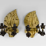 Pair of Hollywood Regency sconces in carved, painted and patinated wood, 1950s