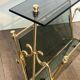 Brass magazine rack and blue-tinted glasses