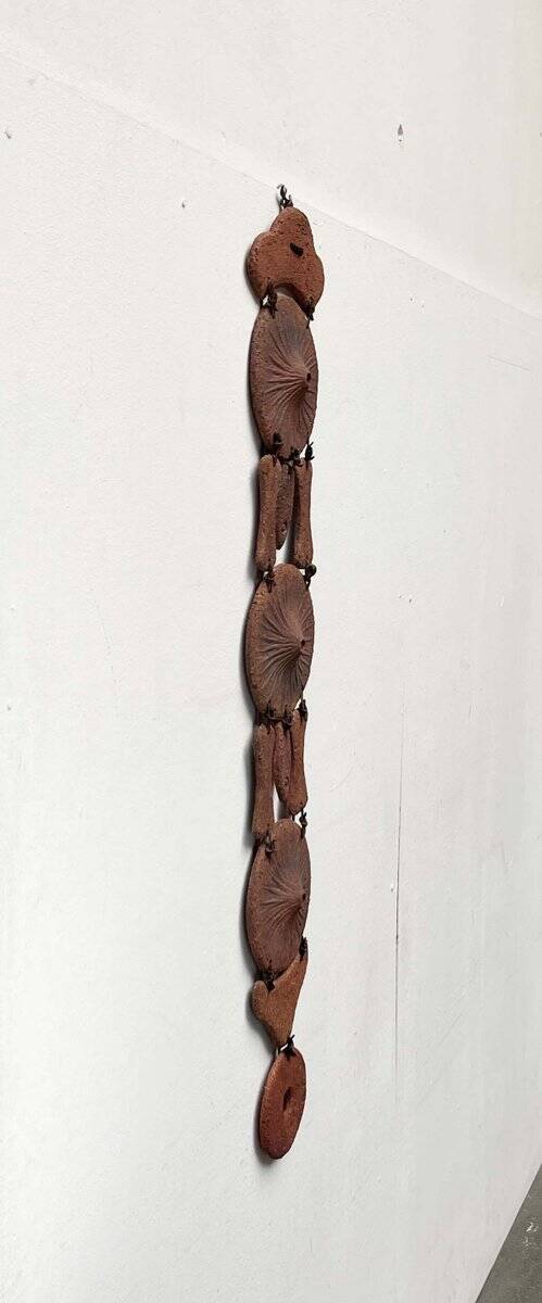 Wall suspension of Danish studio pottery in mid-century brutalist modernist style by Clara Helmich, 1979.