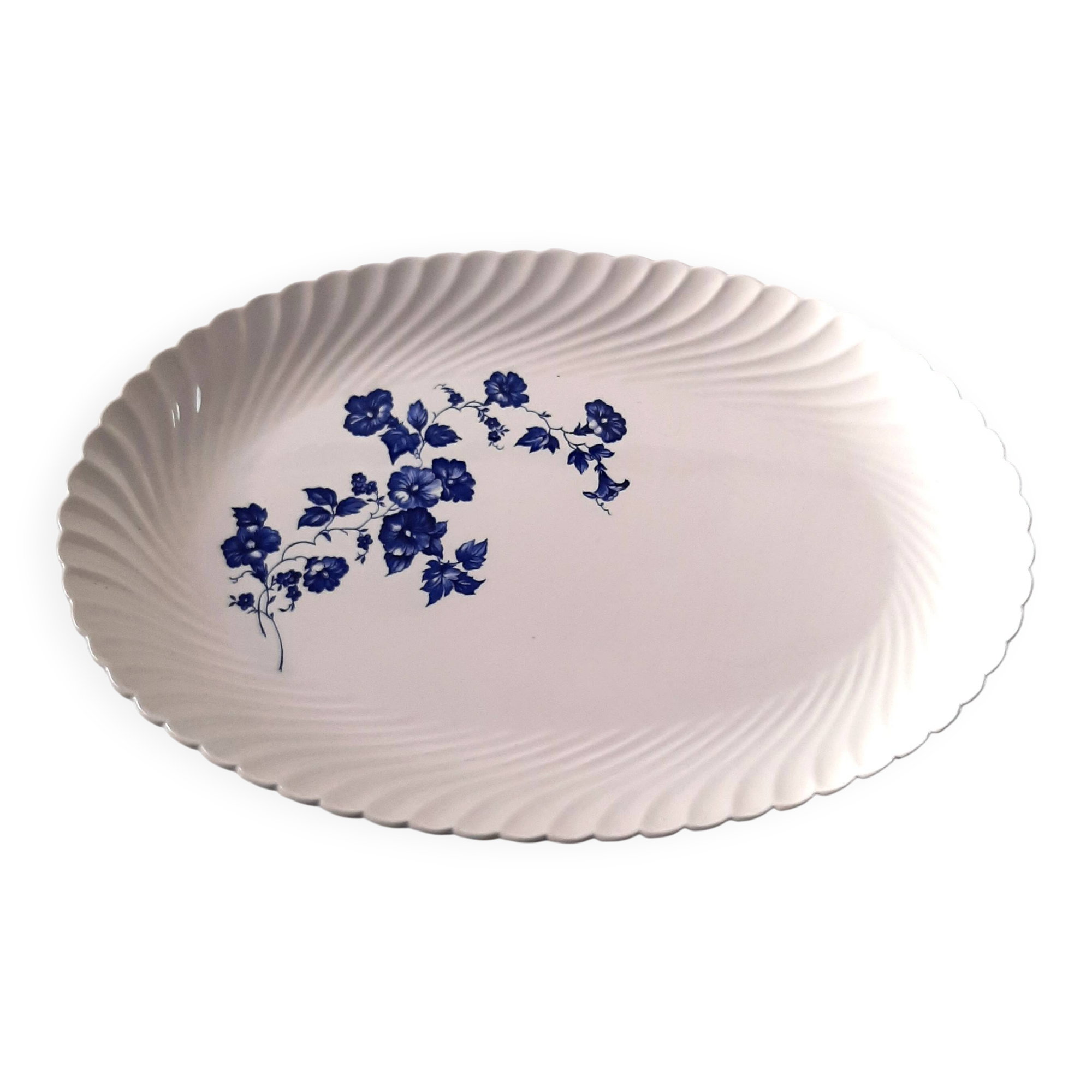 Keller and Guérin Lunéville serving dish with blue flowers on a white background.