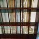 Carved wooden wall shelf for collection or other.