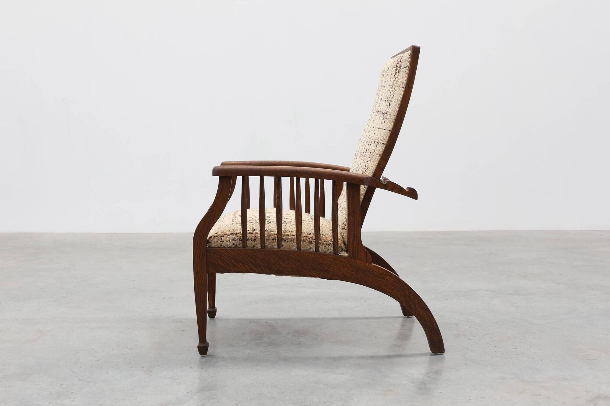 Arts & Craft oak armchair with spindle sides and tweed upholstery, Belgium