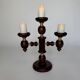 Vintage brutalist wooden candelabrum with gold hardware.
