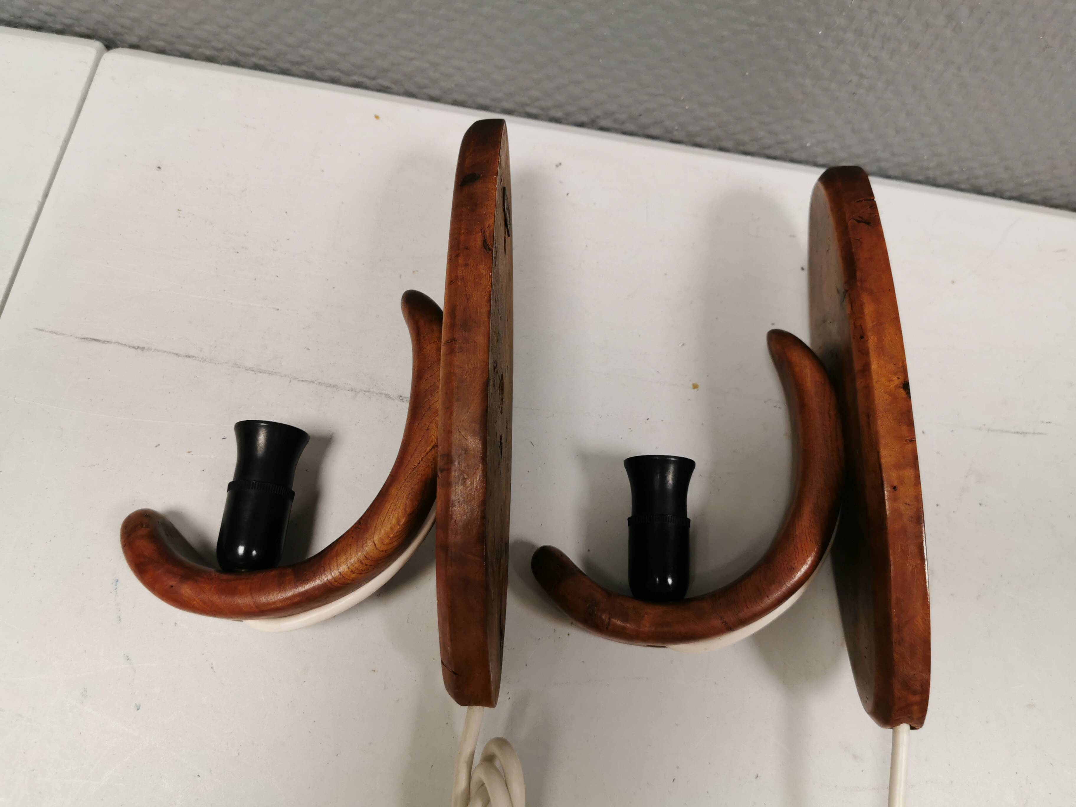 A set of old wall lamps in walnut.