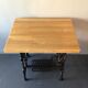 Ancient table, cast iron footing