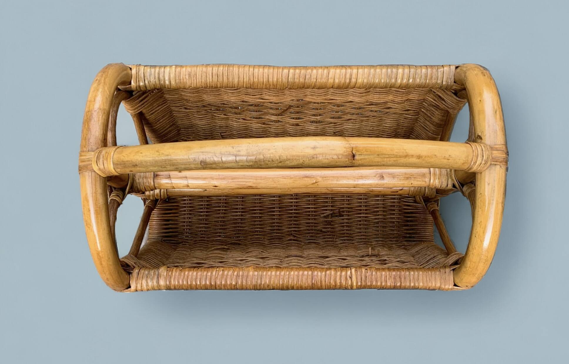 Vintage wicker and bamboo magazine rack