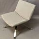Design armchair with light grey skai top