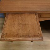 Solid oak pedestal desk, Régy establishments – 1940