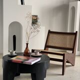 Reclined armchair in canned teak in natural wood