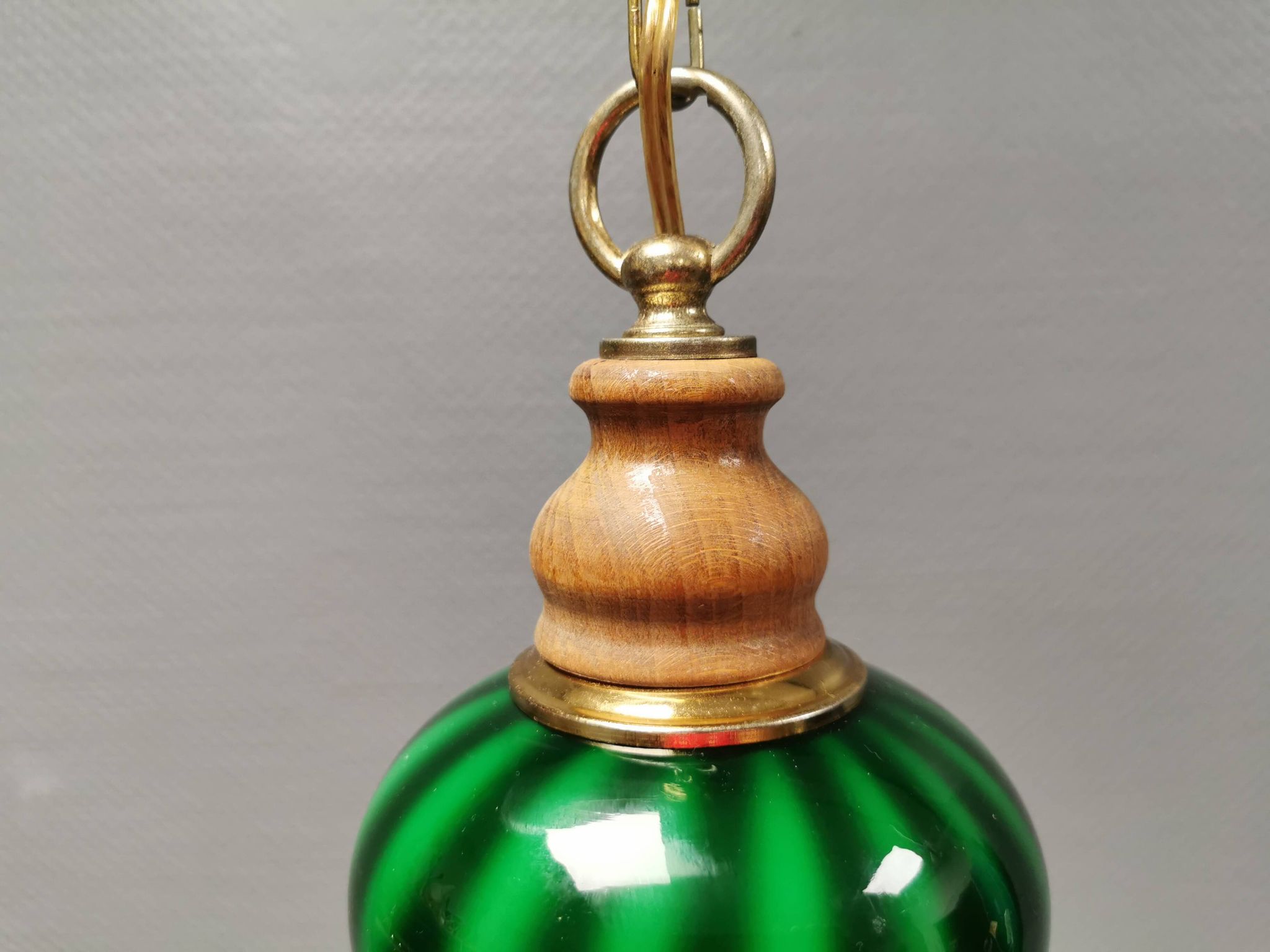 green hanging lamp in double layer glass (white inside) with wooden top and safety chain,