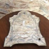 Old beveled Venetian mirror with engraved flower decoration