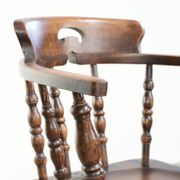 Wooden English antique pub/captain chair from the late 19th century