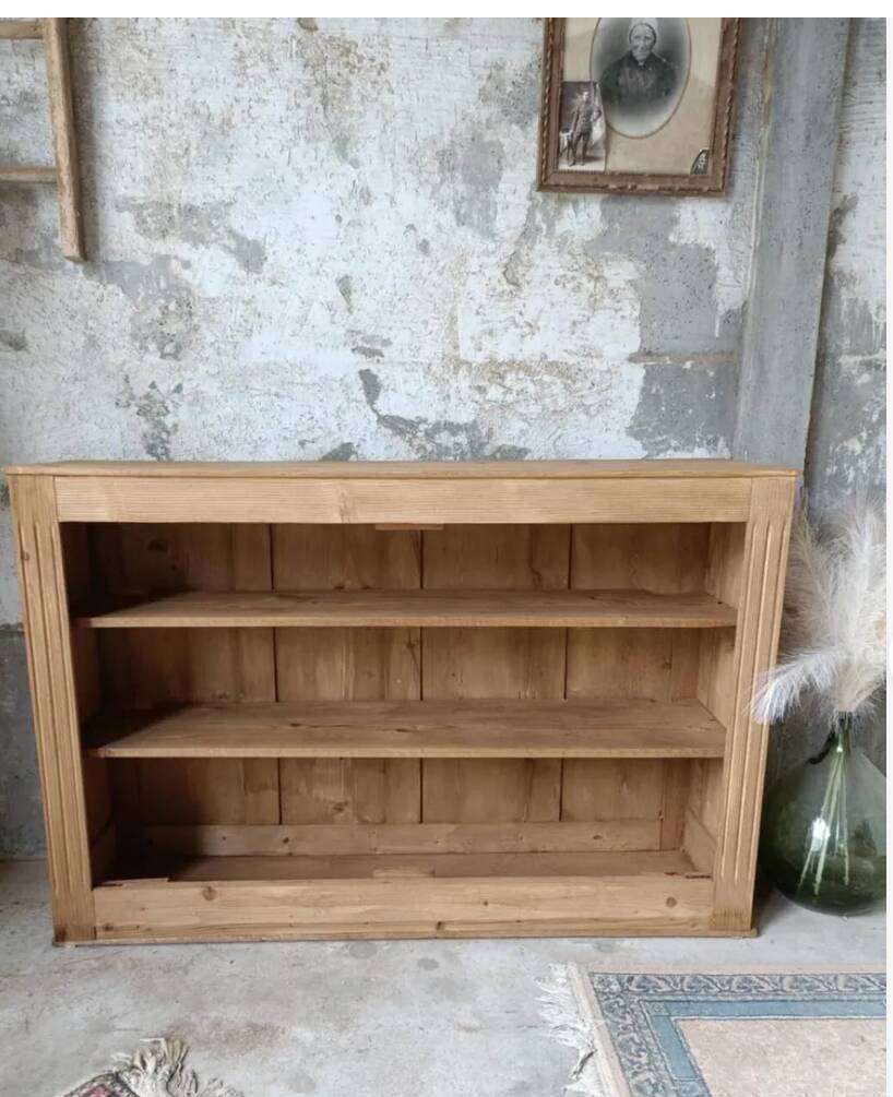 Open wooden chest of drawers