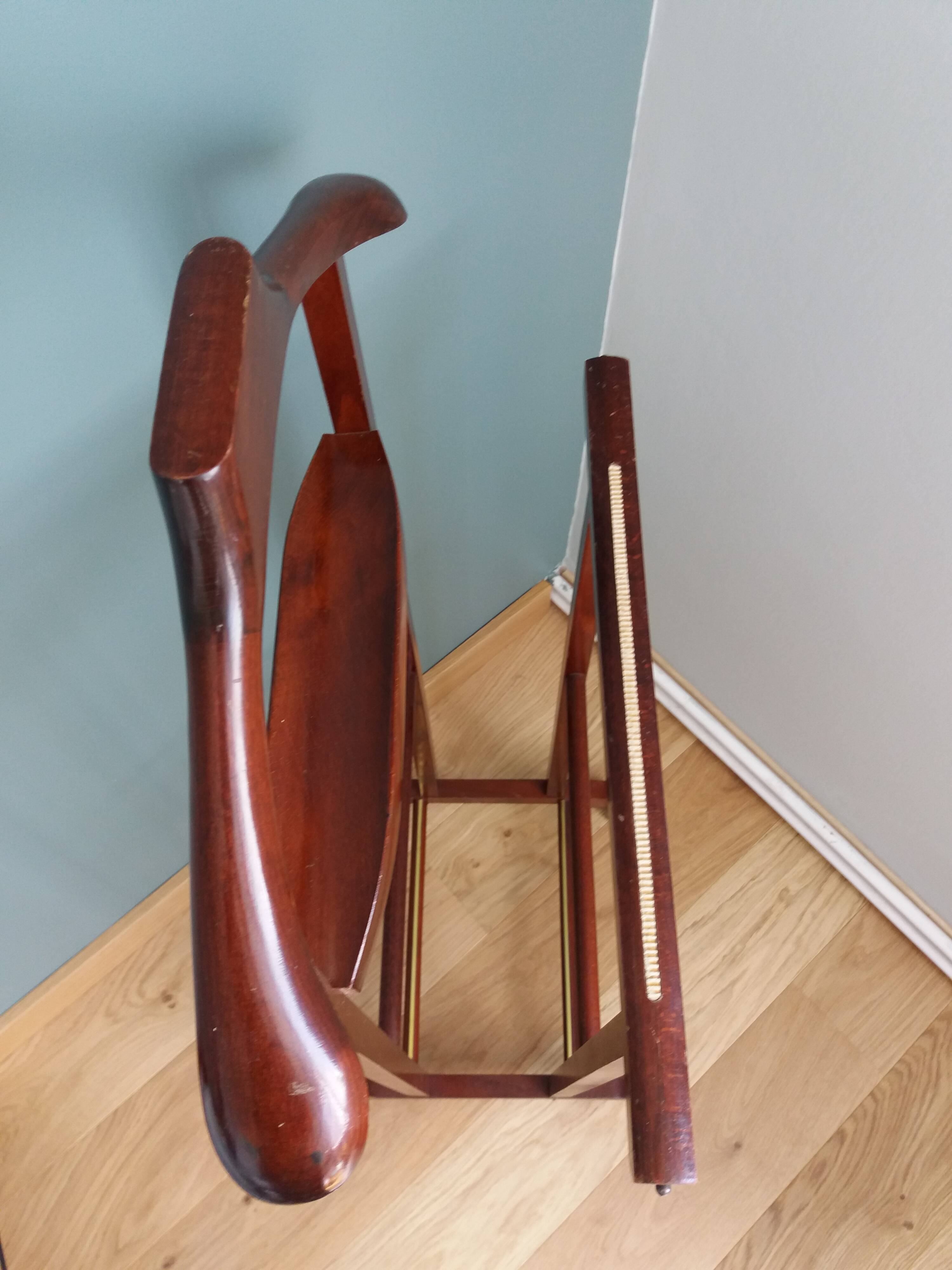 Night stand with two clothes racks