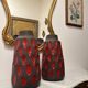 Pair of "drippy" ceramic vases by Tyson LONDON
