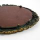 Beautiful small French mid-century wall mirror with an ornate brass frame