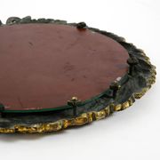 Beautiful small French mid-century wall mirror with an ornate brass frame