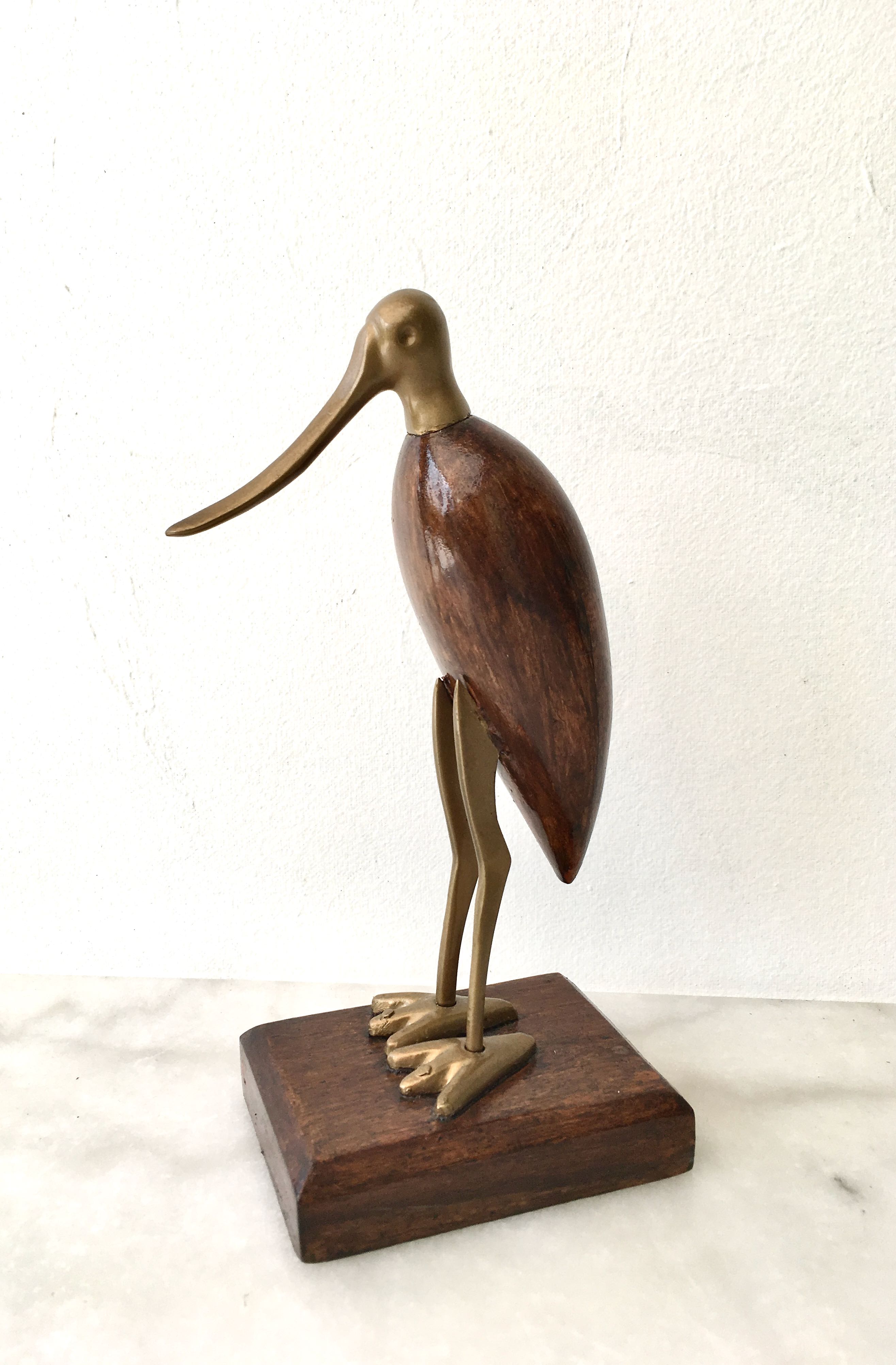 Animal marabout in teak and brass