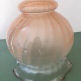 Globe with transparent peach colored glass rims