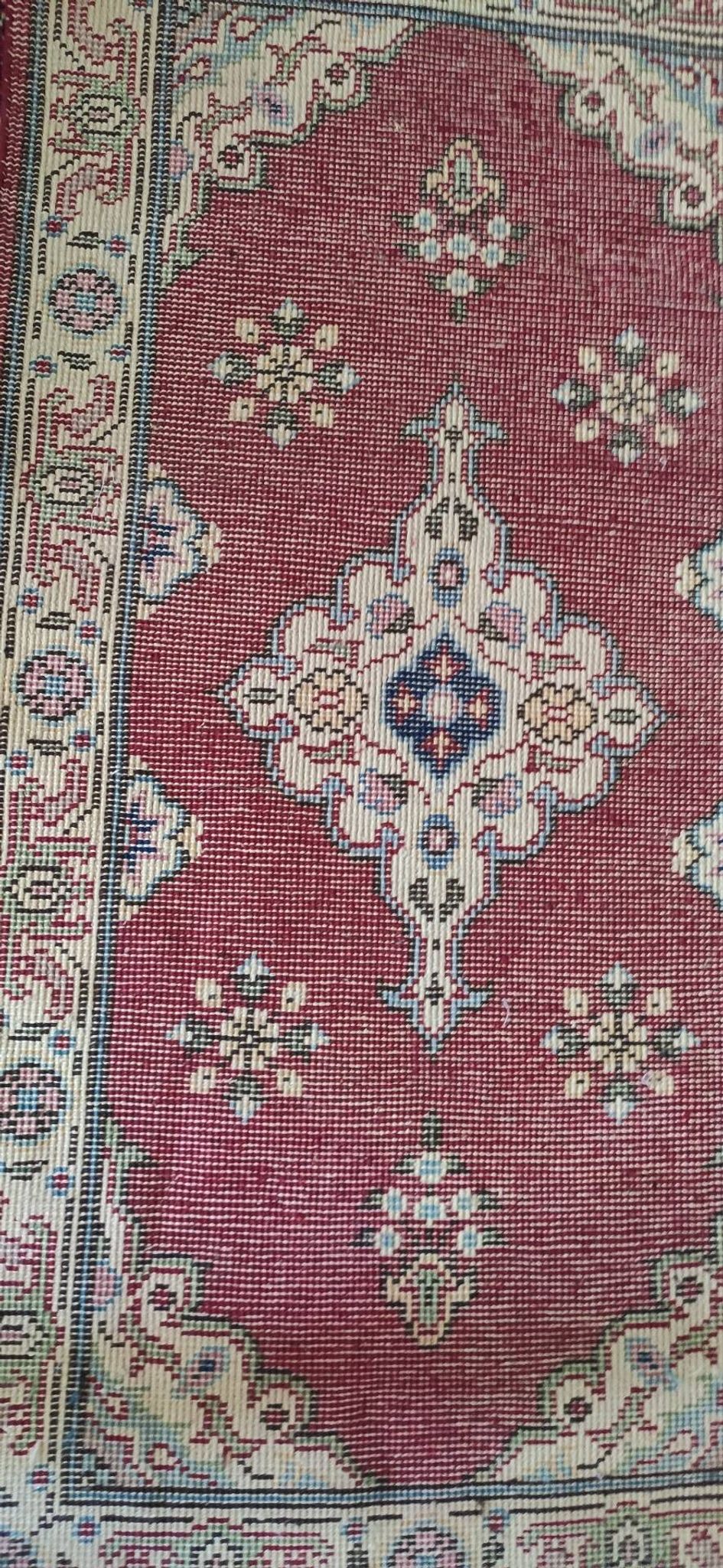 Small Persian rug from the 1960s.