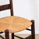Set of 4 brutalist chairs in carved wood and straw – Circa 1940
