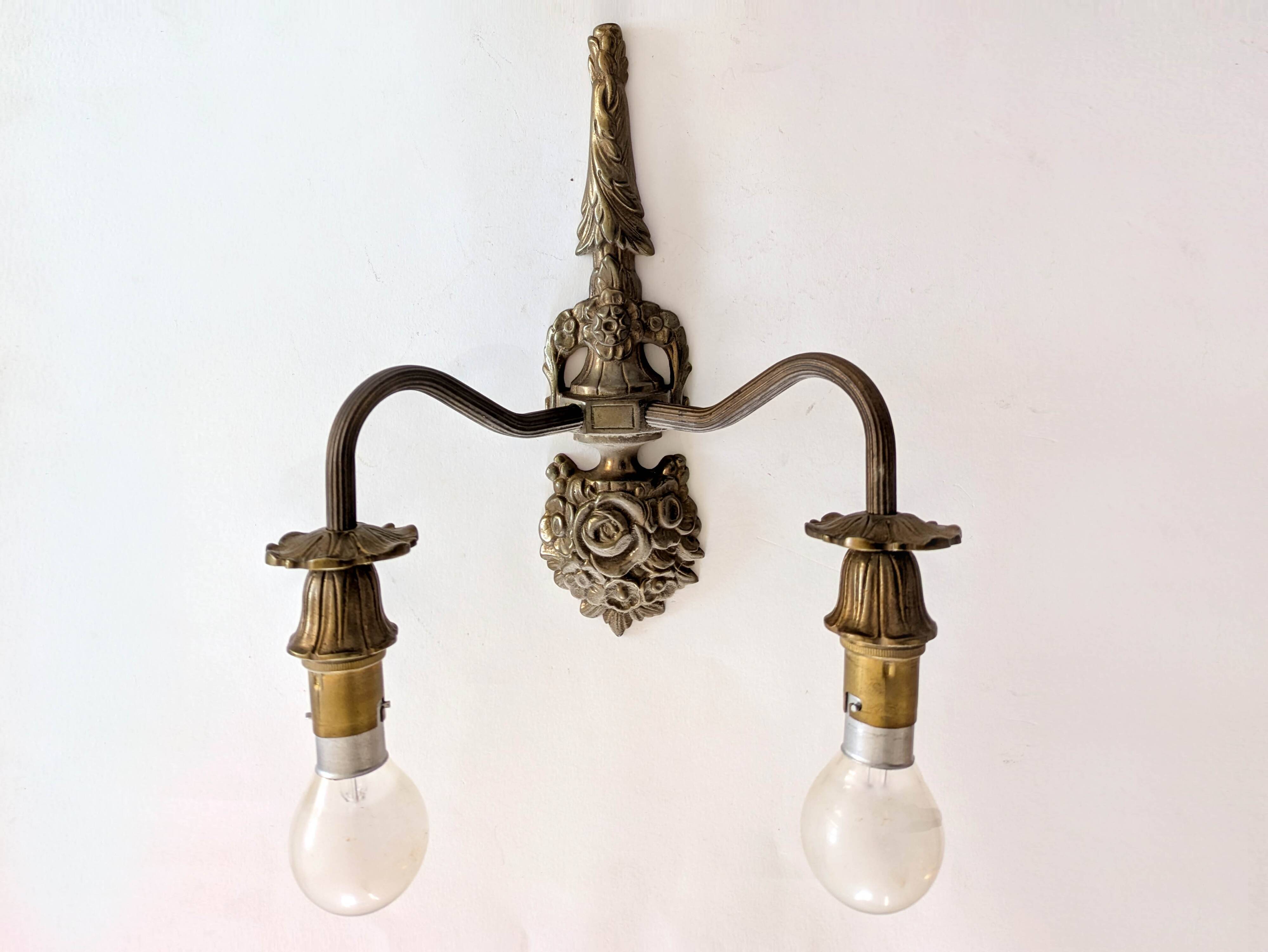 Two antique wall lights