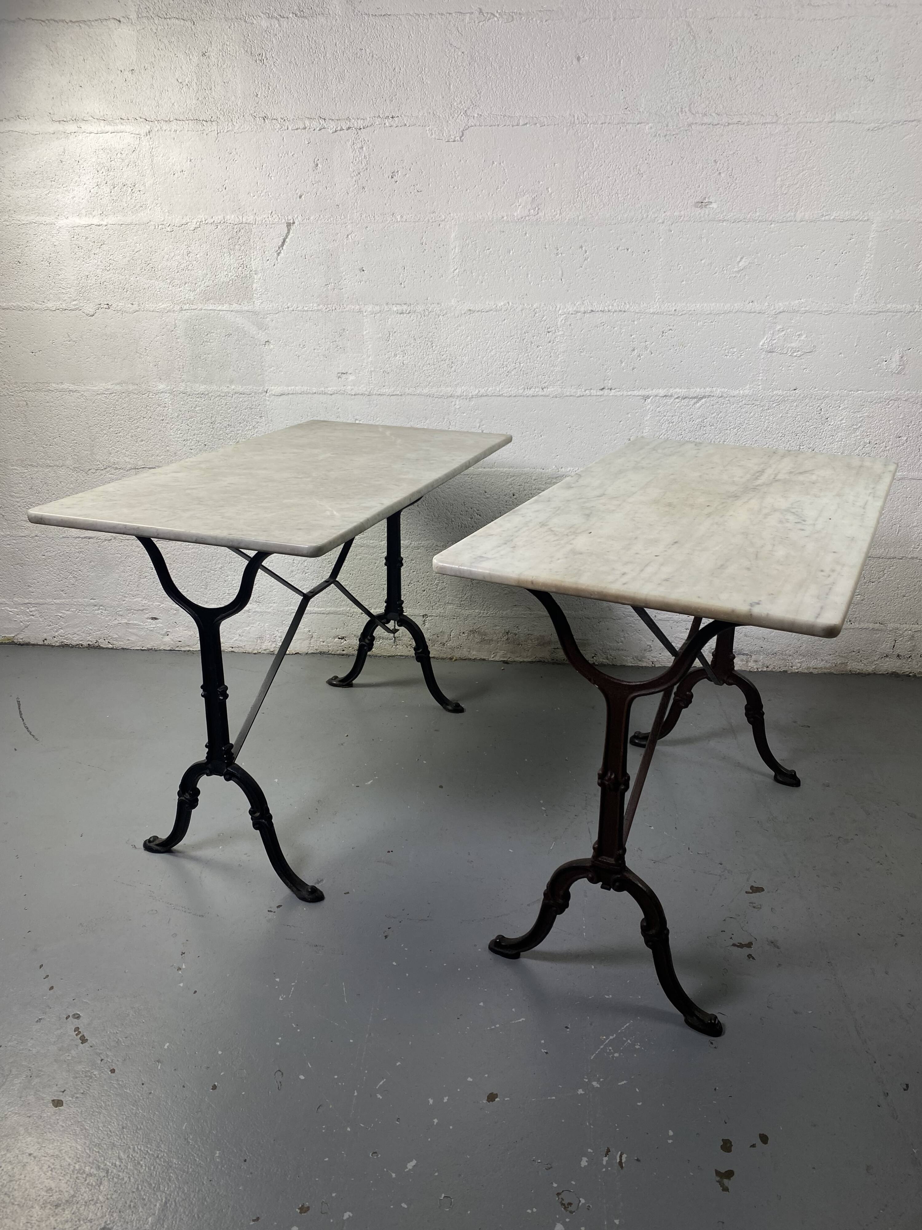 Set of two bistro tables in marble and wrought iron