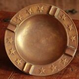 Ancien cendrier en laiton etoiles