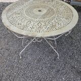Old garden table in solid wrought iron