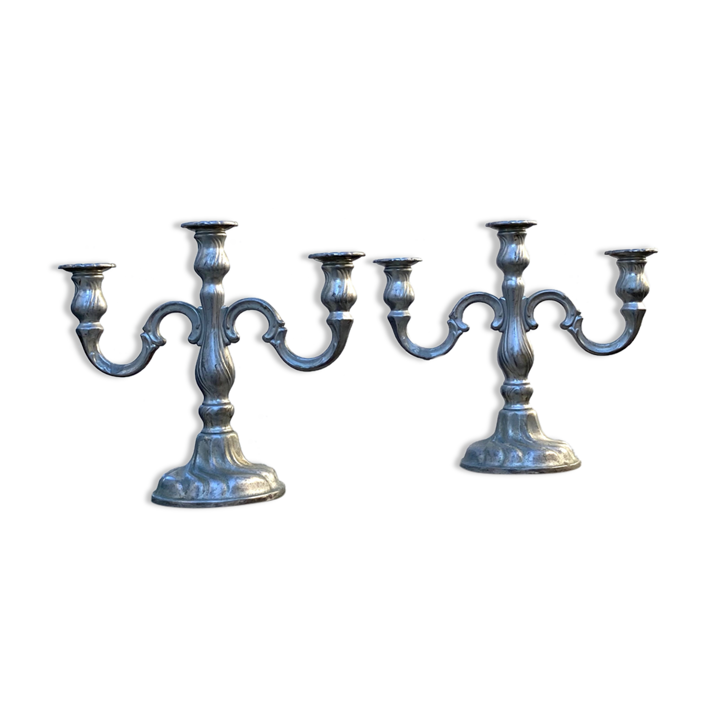 Set of two metal candlesticks