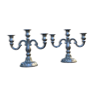 Set of two metal candlesticks