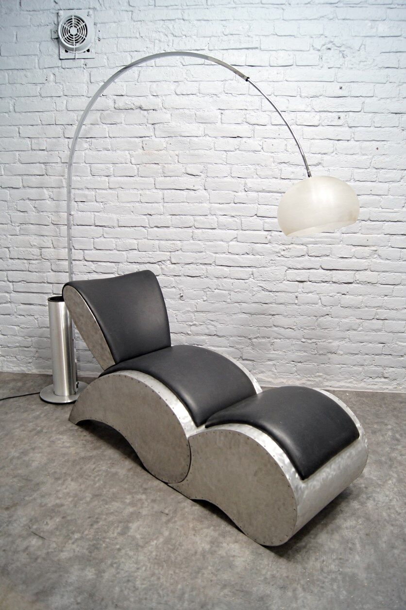 Industrial aluminum & vinyl lounge chair with footrest, 1970s