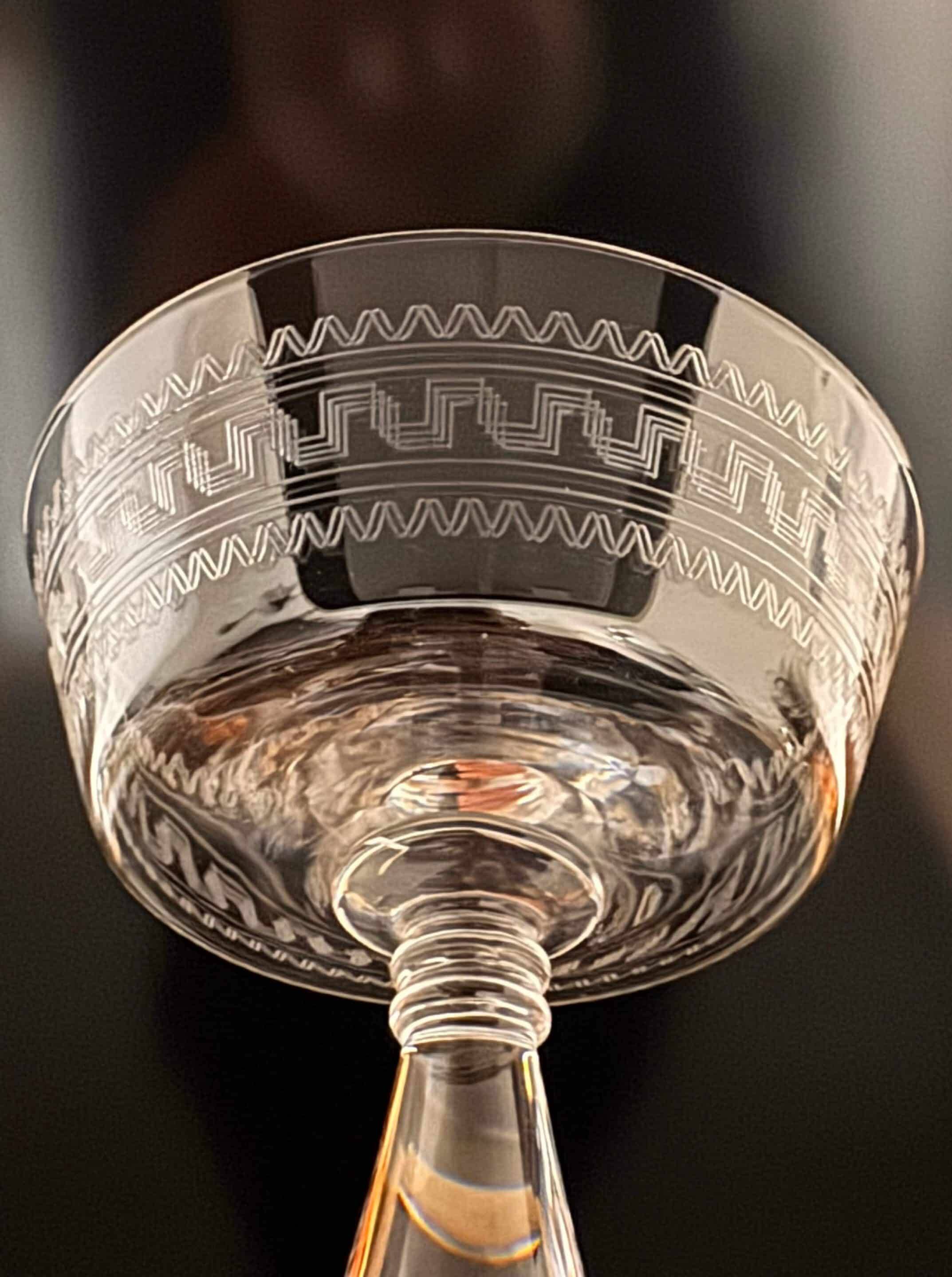 Baccarat, set of 10 engraved crystal champagne glasses from 1900.