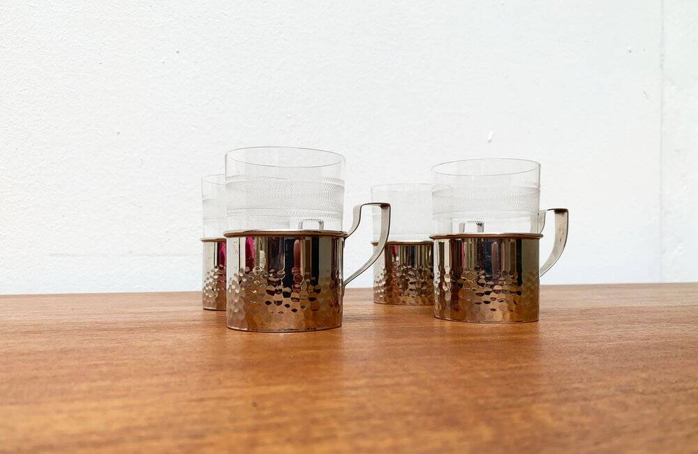 Vintage tea glasses RDA from East Germany by MUQ, Metallwarenfabrik Union Quedlinburg, set of 4.